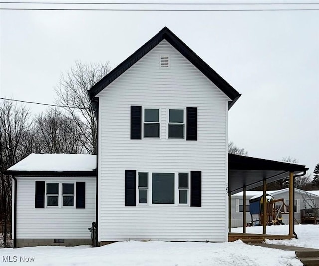 view of snow covered property