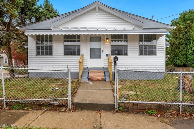 bungalow with a front yard