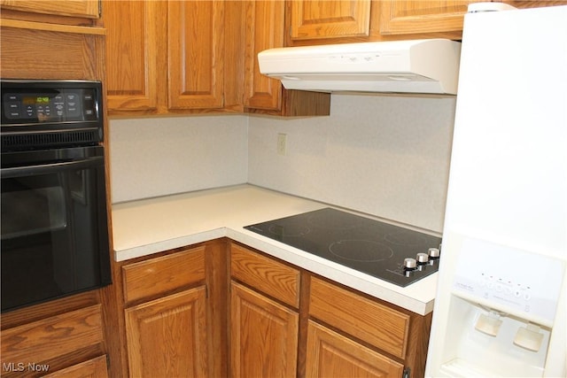 kitchen with black appliances