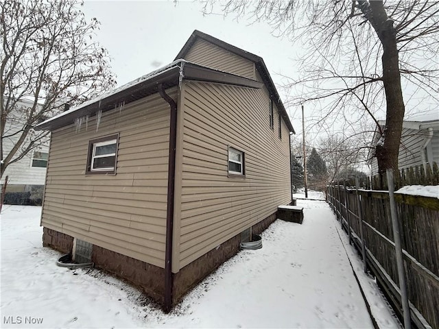 view of snow covered property