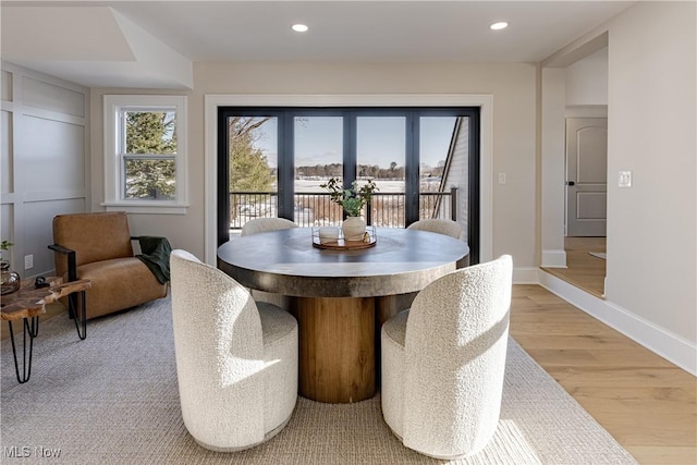 dining space featuring light hardwood / wood-style floors