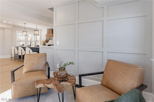 living area featuring light wood-type flooring