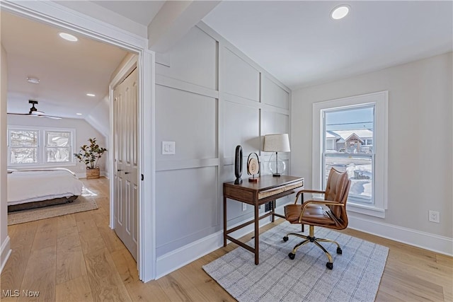 office with ceiling fan, light hardwood / wood-style floors, and lofted ceiling