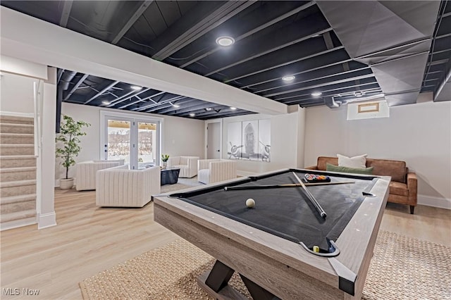 game room featuring hardwood / wood-style floors, french doors, and billiards