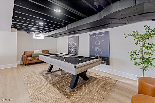 rec room with billiards and hardwood / wood-style flooring