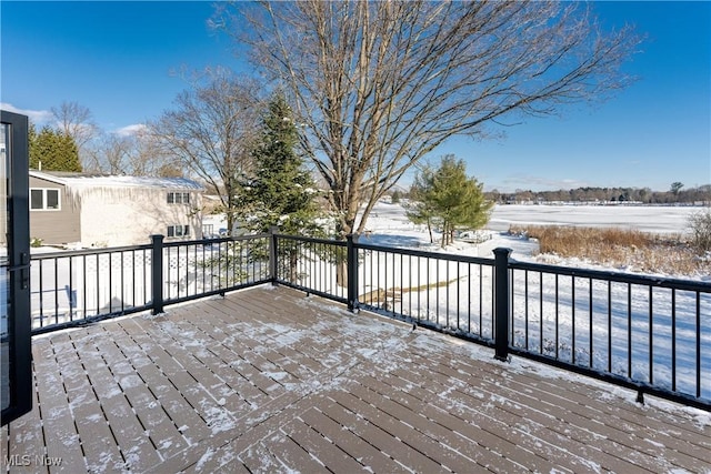 view of snow covered deck