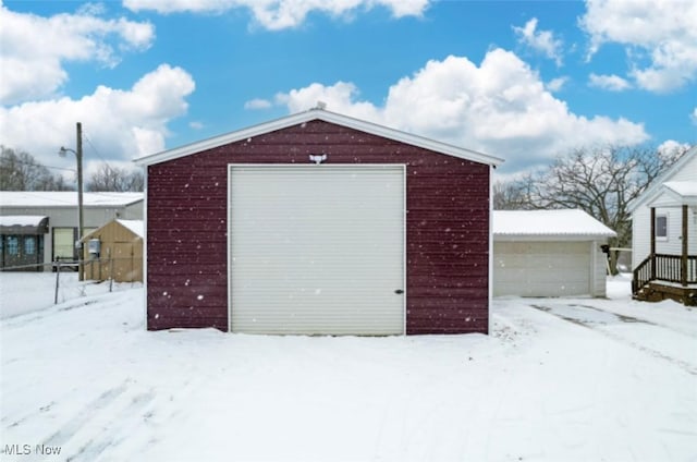 view of snow covered garage