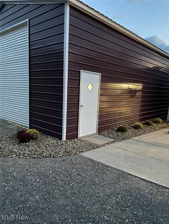 view of outbuilding featuring a garage