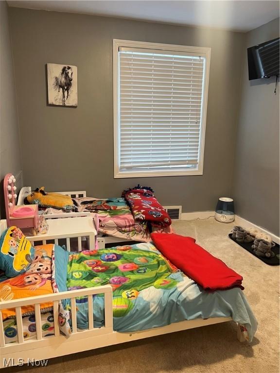 bedroom with carpet