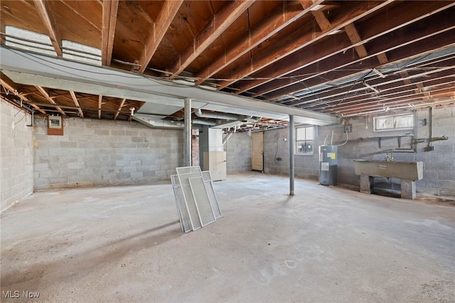 basement with sink and water heater