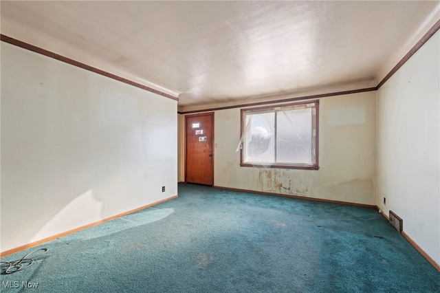 unfurnished room featuring carpet floors