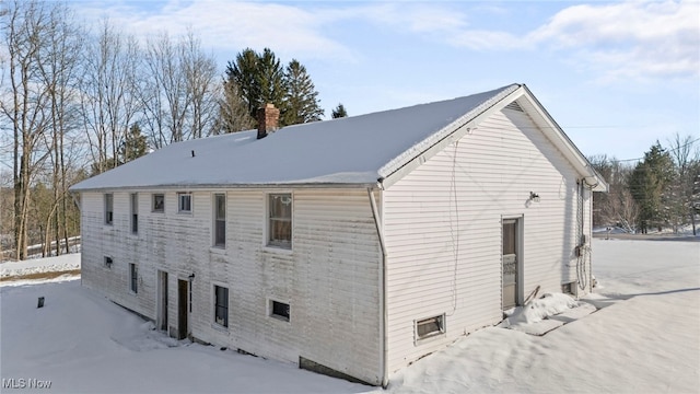 view of snow covered property