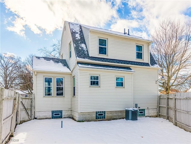 view of snow covered house