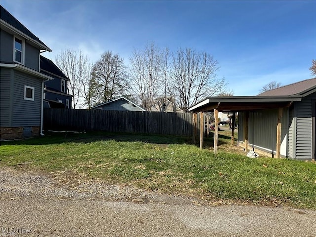 view of yard featuring a carport