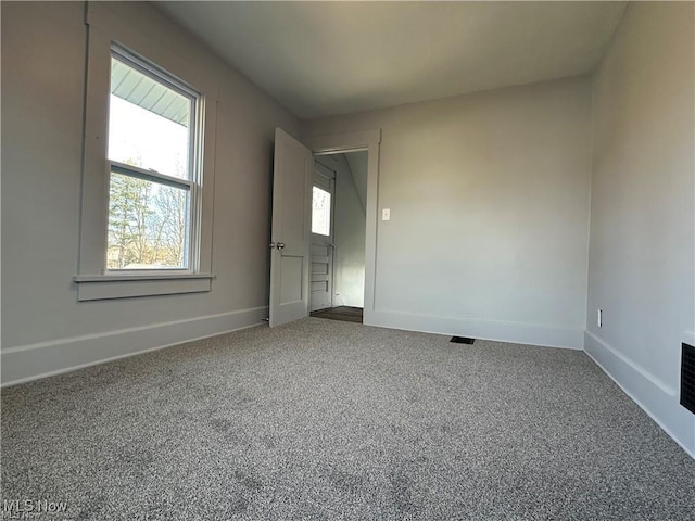 view of carpeted spare room