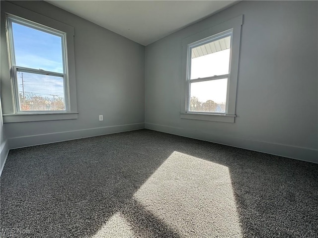 spare room featuring plenty of natural light