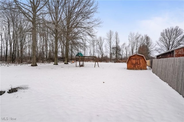 view of yard covered in snow