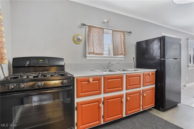 kitchen featuring sink and black appliances