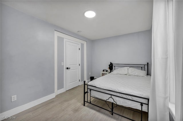 bedroom featuring light hardwood / wood-style floors