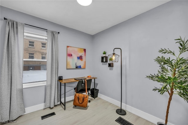 office area featuring light hardwood / wood-style floors