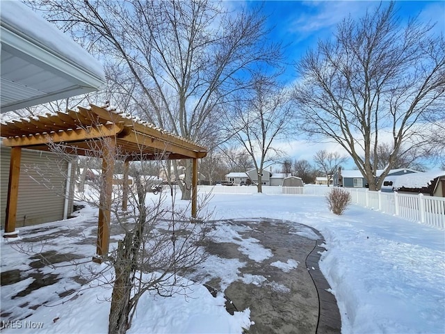 view of yard layered in snow