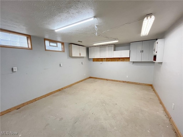 basement with a textured ceiling