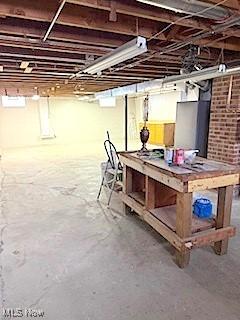 basement with a workshop area