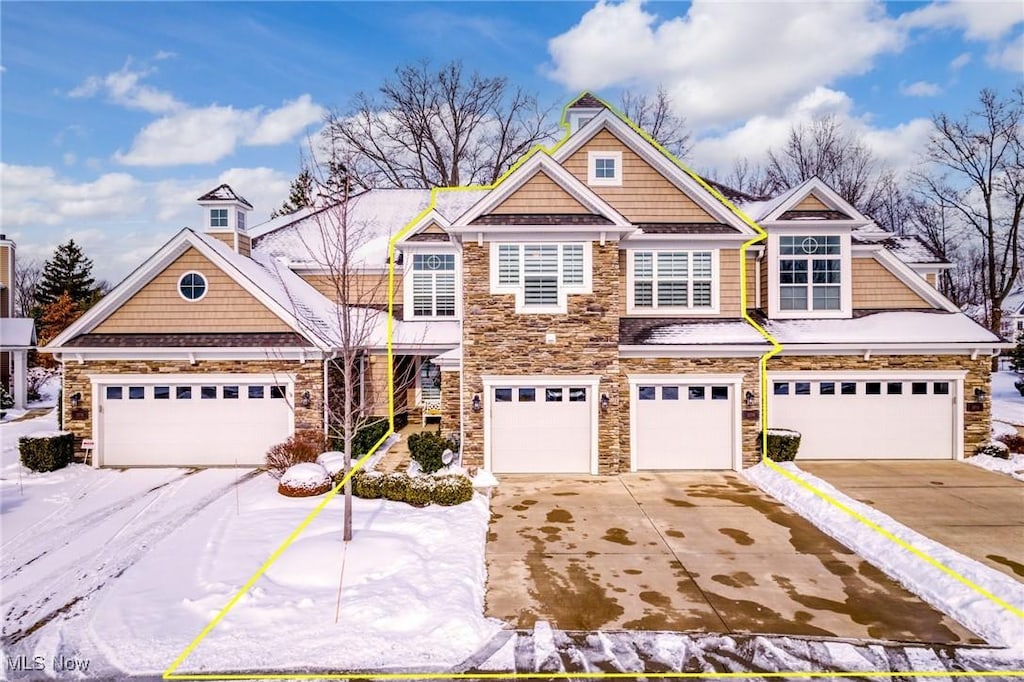 craftsman-style home featuring a garage