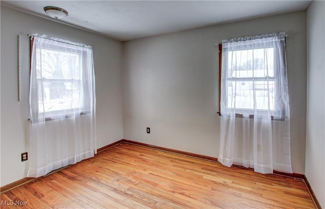 empty room featuring light wood-type flooring