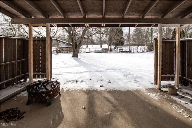 exterior space with a fire pit