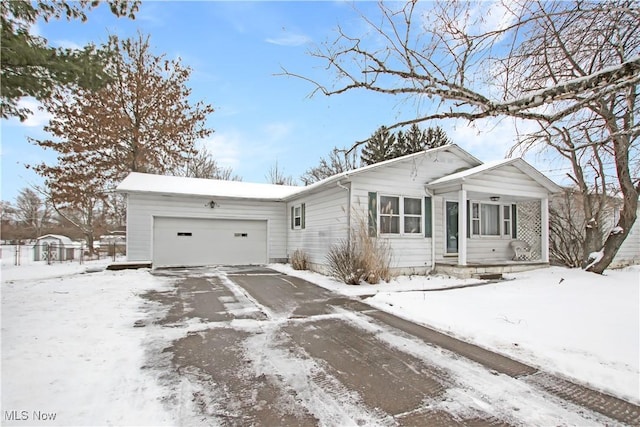 ranch-style home with a garage