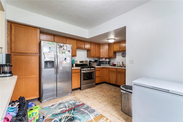 kitchen with sink and stainless steel appliances