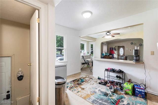 kitchen featuring ceiling fan