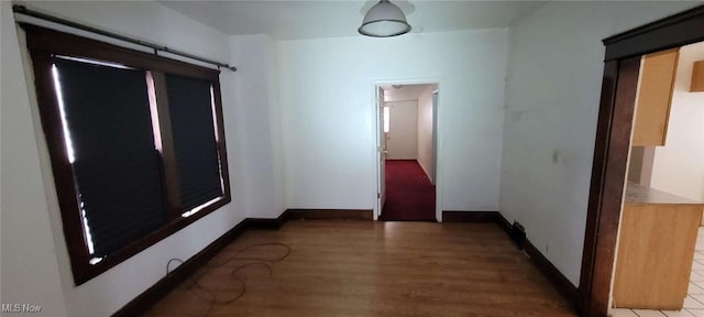 hall featuring dark hardwood / wood-style flooring