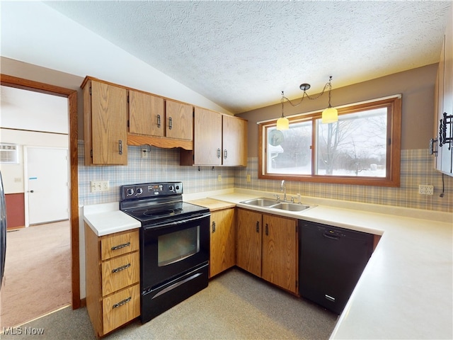 kitchen featuring sink, vaulted ceiling, decorative backsplash, hanging light fixtures, and black appliances