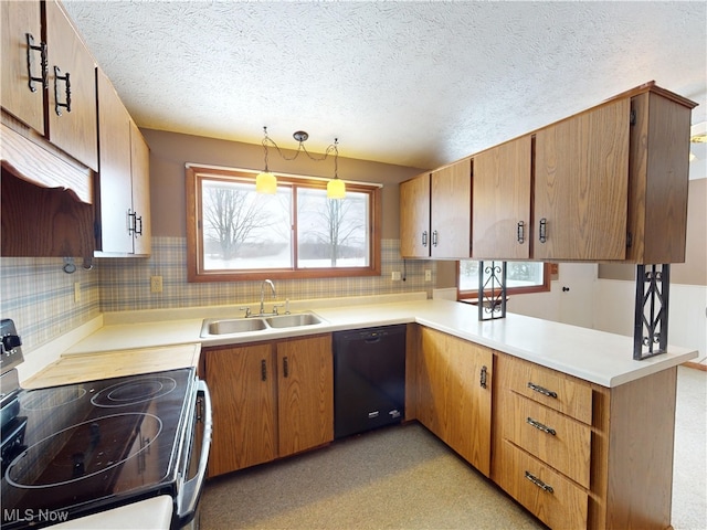 kitchen featuring sink, decorative light fixtures, dishwasher, tasteful backsplash, and stainless steel electric range oven