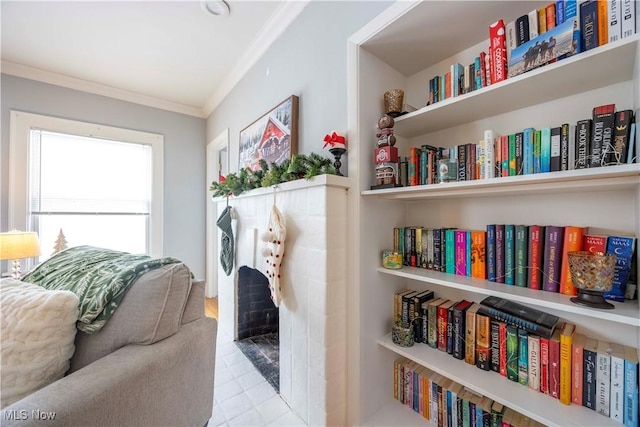 sitting room featuring ornamental molding