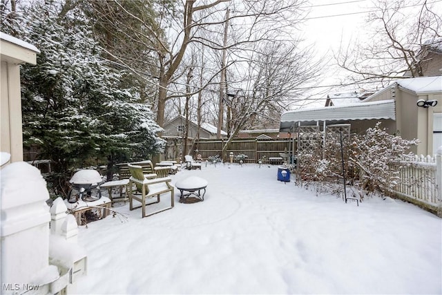 view of yard covered in snow