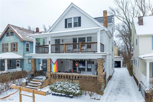 view of front of home with a balcony