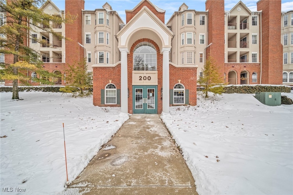 view of snow covered property