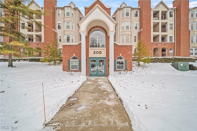 view of snow covered property