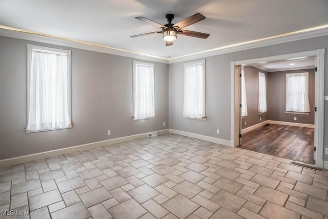 unfurnished room with ceiling fan and crown molding