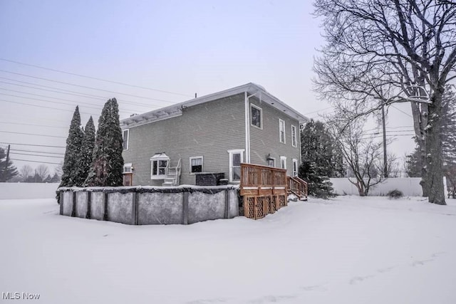 view of snow covered property