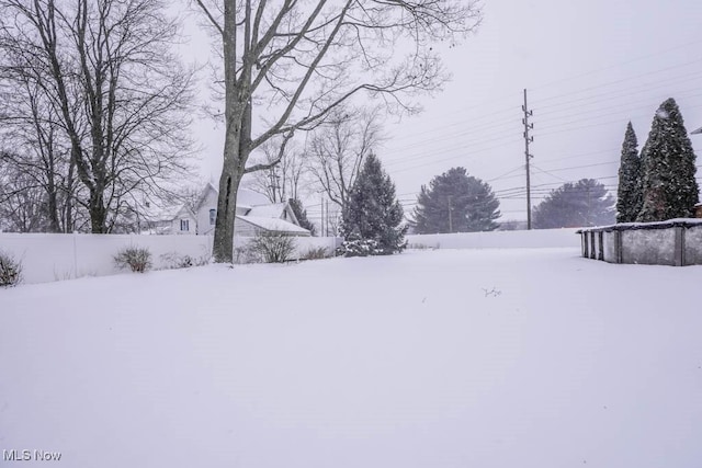 view of snowy yard