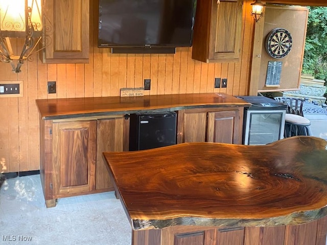 bar with wooden walls and light carpet