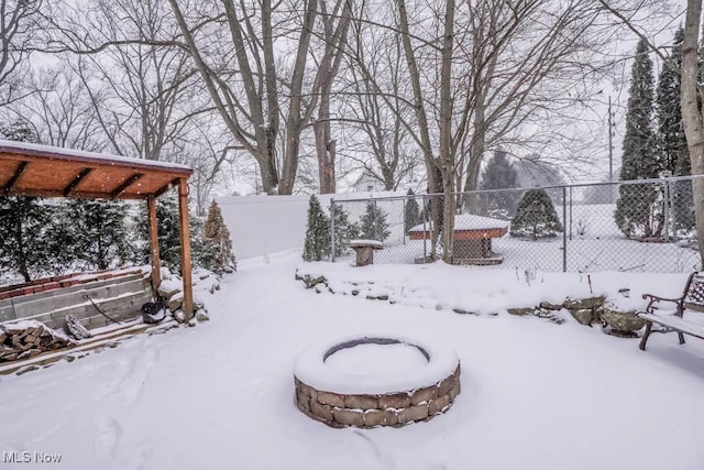 view of yard covered in snow