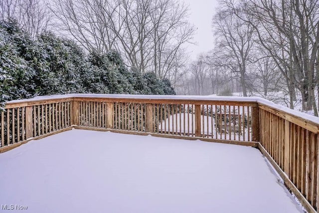 view of snow covered deck