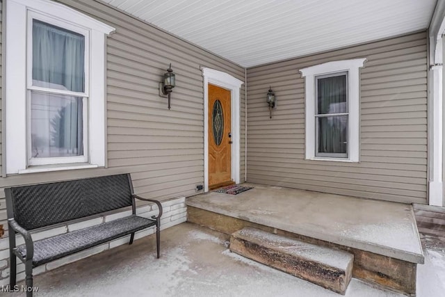 property entrance with a porch