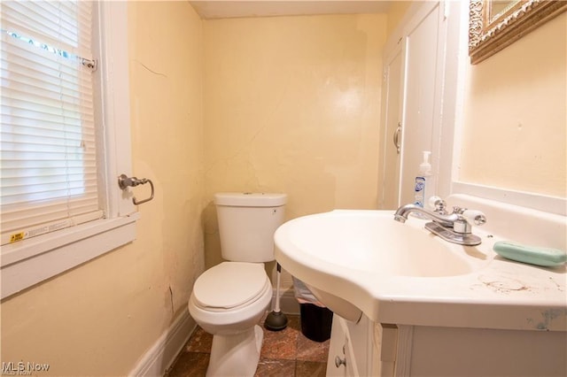 bathroom featuring toilet