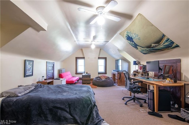 carpeted bedroom featuring vaulted ceiling and ceiling fan